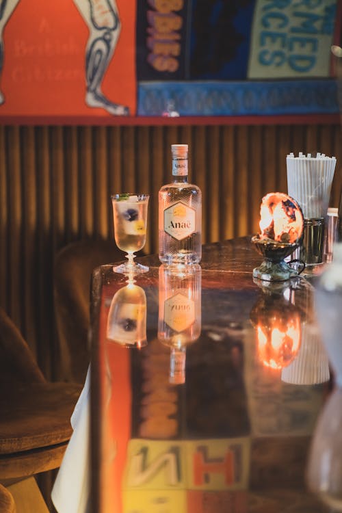 Free A Cocktail and a Gin Bottle Standing on the Table  Stock Photo