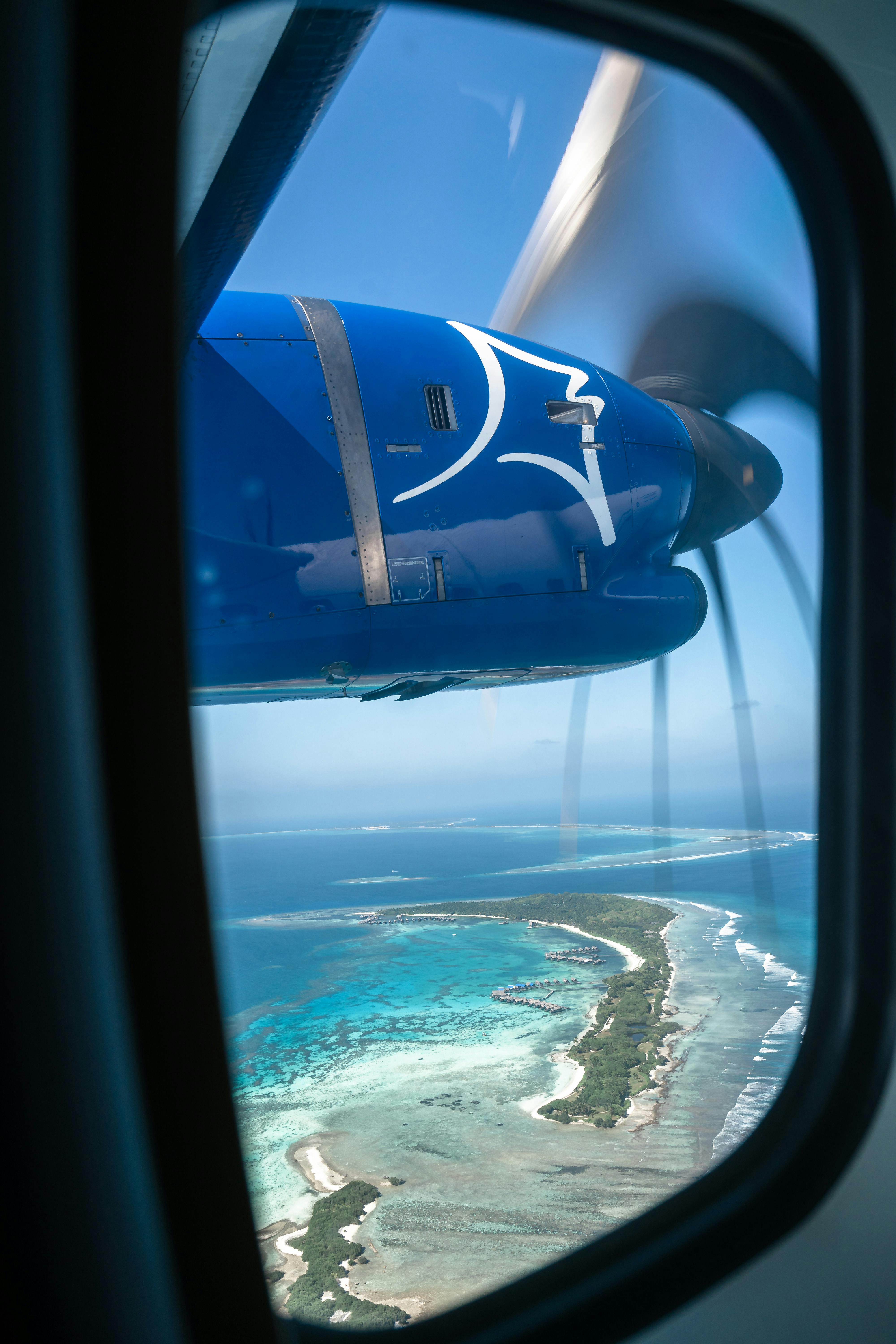 Airplane Propeller behind Window · Free Stock Photo