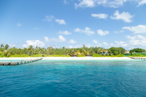 Бесплатное стоковое фото с берег, голубое небо, курорт