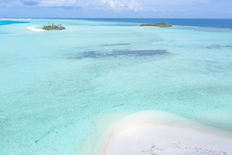 Blue Sea Shore Around Tropical Islands