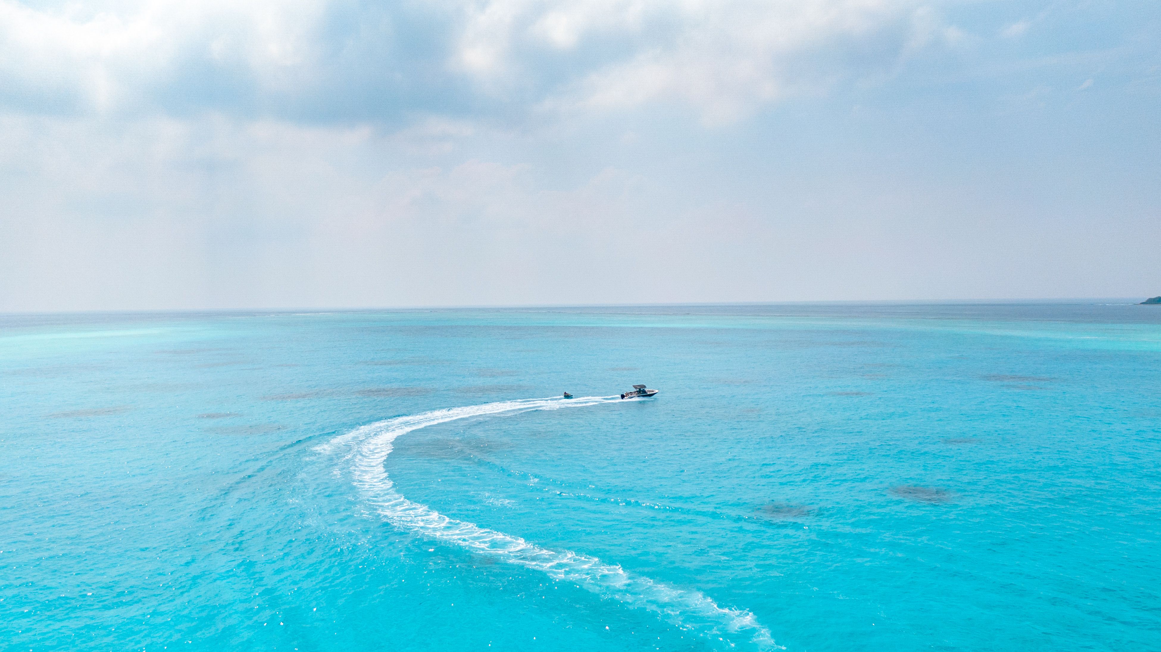 Aerial View of Wooden Motorboat at Sea · Free Stock Photo
