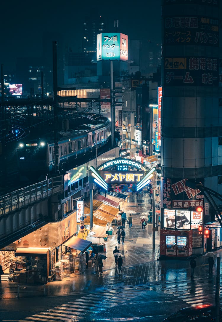 Illuminated Street Of Tokyo, Japan At Night 