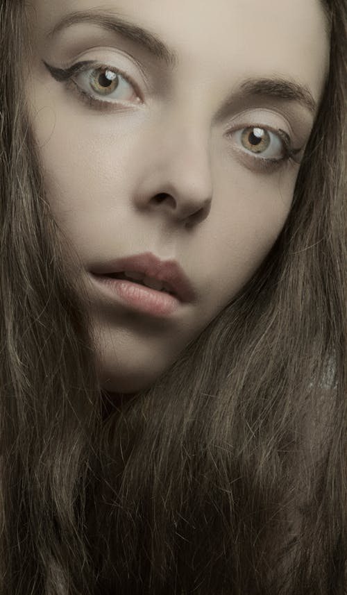 A Close-up of a Young Woman with Brown Eyes