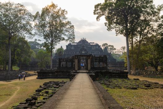 Explore the captivating ancient temple ruins surrounded by lush greenery, a testament to historical architecture.