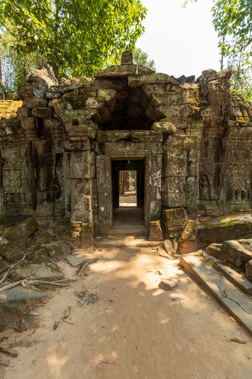 Free Explore the mystical entrance of an ancient temple in Angkor Wat, Cambodia. Stock Photo