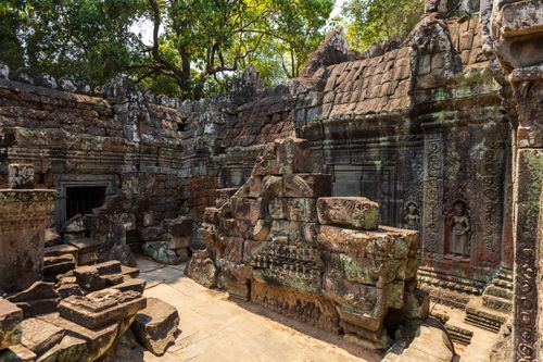 Free Explore ancient stone ruins of a temple in Cambodia, showcasing intricate carvings and rich cultural heritage. Stock Photo