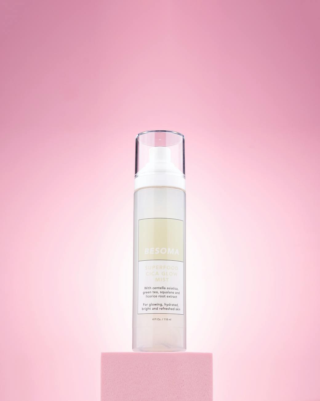 skincare bottle on pink background representing retinol skincare
