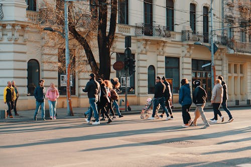 Pedestrians Crossing a Road in a City