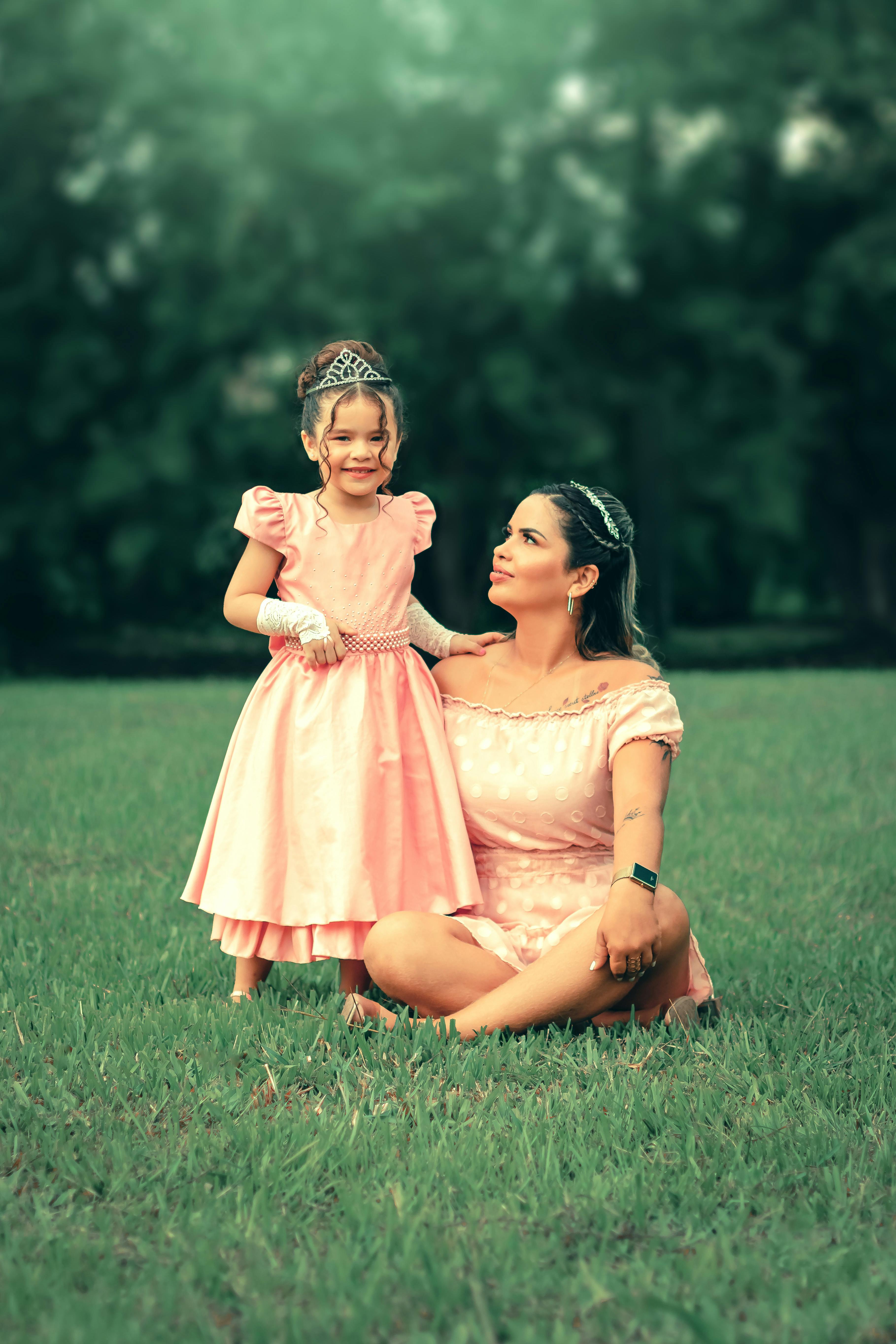 free photo of mother and daughter in dresses