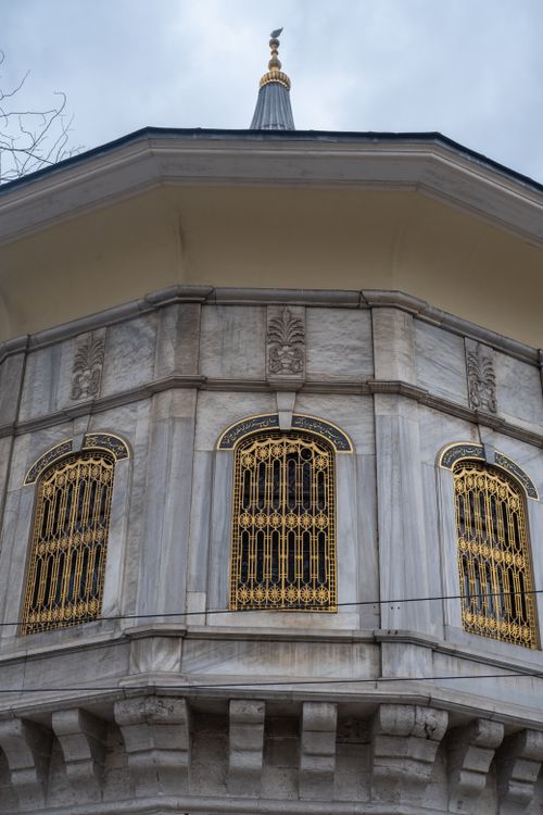 Free Close-up of distinctive Ottoman architecture with ornate golden gratings in Istanbul. Stock Photo