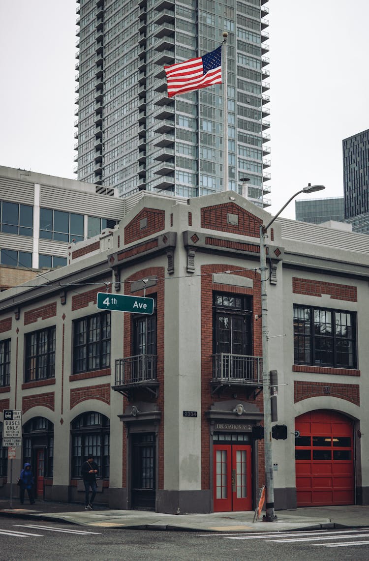 USA Flag On Building On City Street