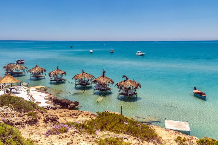 Huts On Tropical Sea Shore