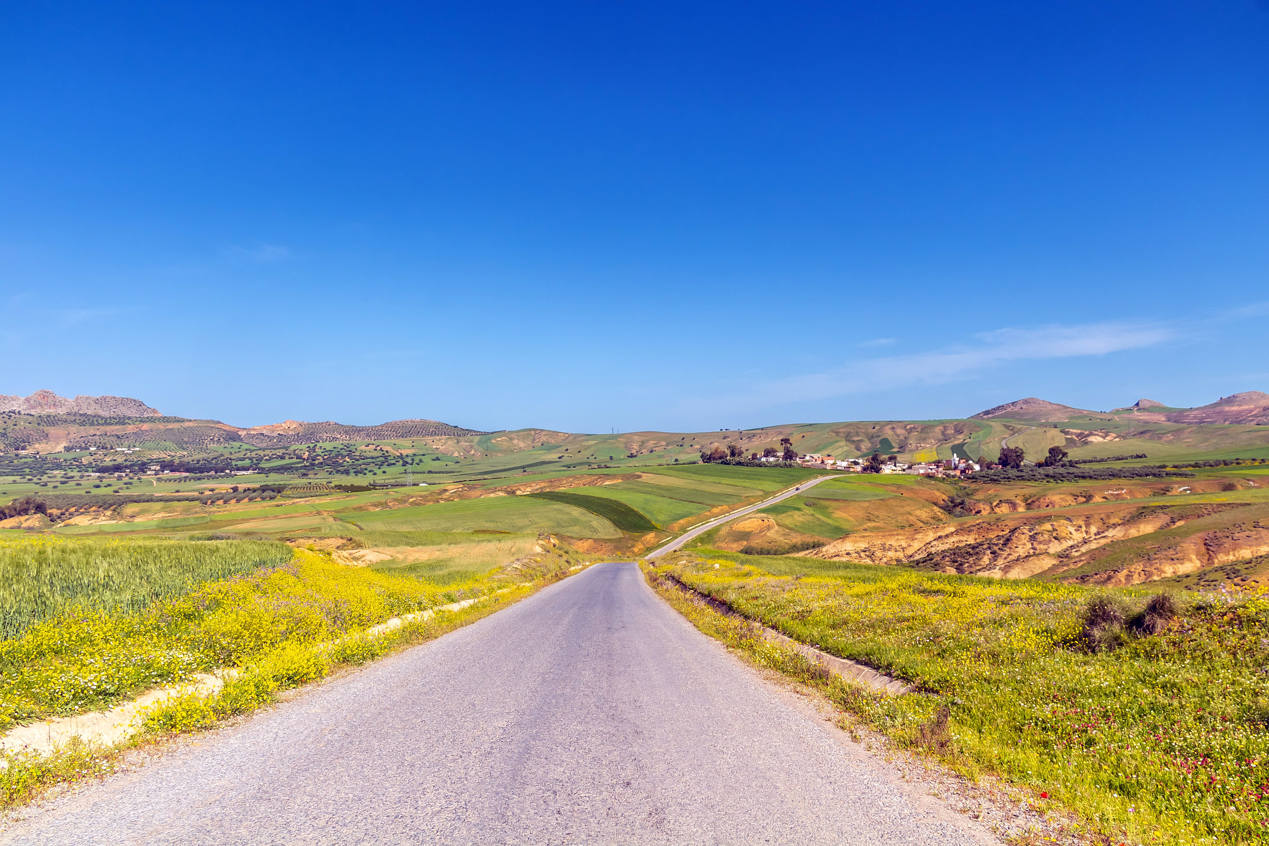 Landscape of a Road through Countryside Fields and Hills · Free Stock Photo