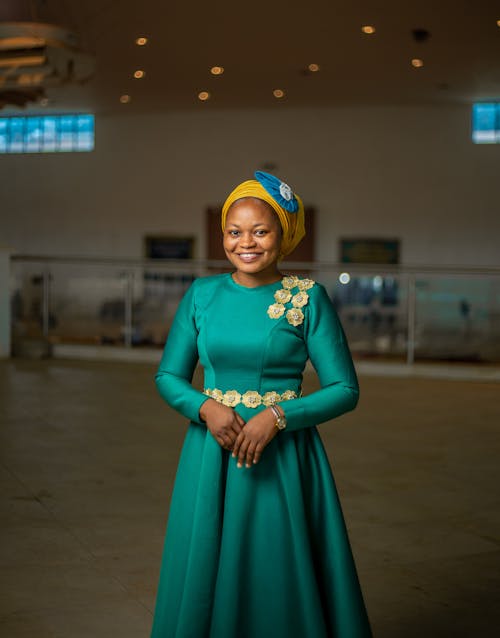 Smiling Woman in Green Dress