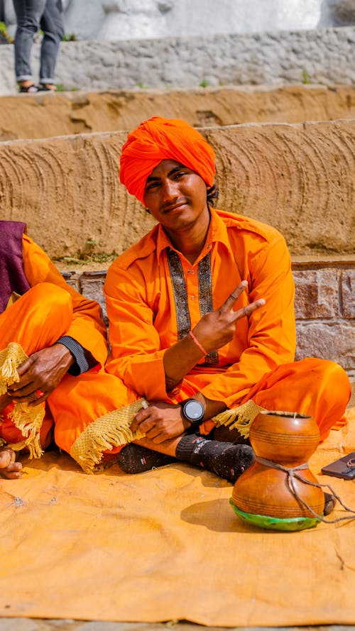 Man Posing in Traditional Clothing