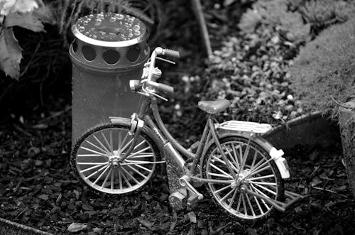 Toy Bicycle near Garden Lamp