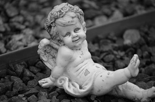 Baby Angel Sculpture on Railway