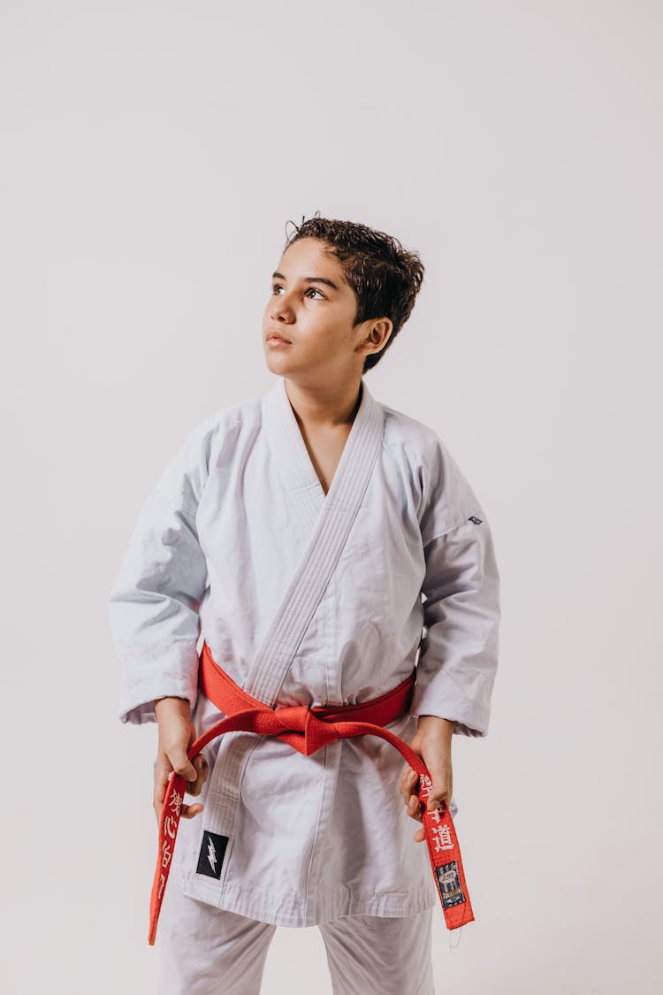 Portrait Of Boy In Karate Kimono