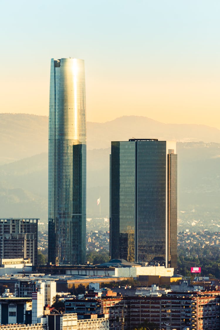 View Of The Mítikah In Mexico City On The Background Of Mountains At Sunset