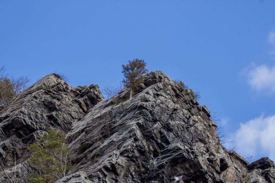 A striking view of rocky cliffs against a clear blue sky in Harpers Ferry, WV.
