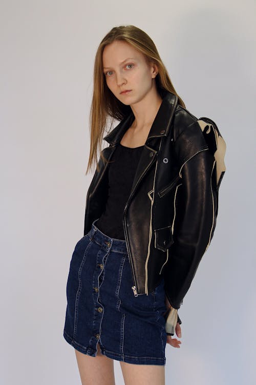 Woman Posing in Jacket and Skirt 