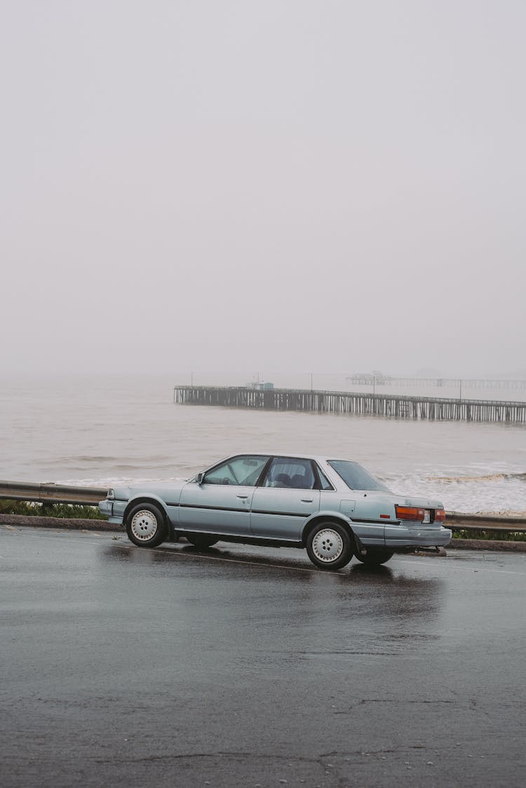 Car On Sea Shore