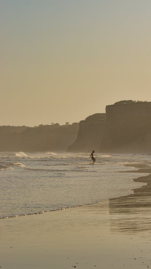 Person Surfing in the Sea