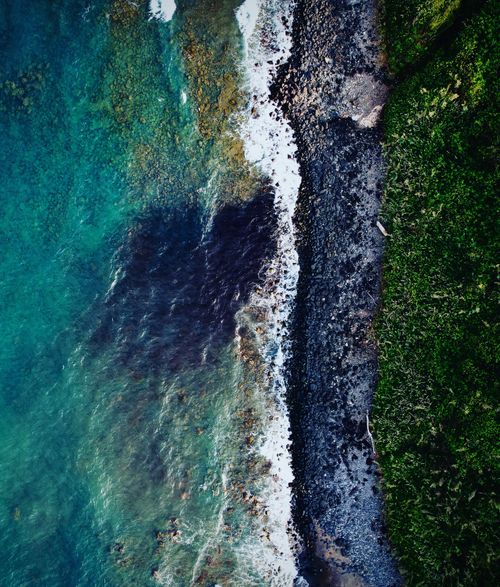 Free Stunning aerial view of Veracruz coastline with turquoise waters and lush greenery. Stock Photo