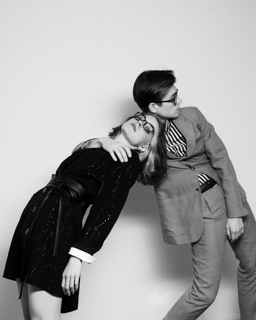 Couple Wearing Eyeglasses in Studio