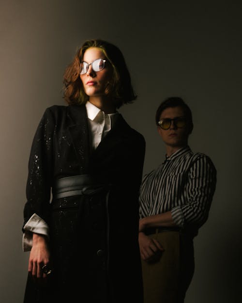 Woman and Man in Eyeglasses Posing