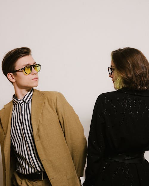 Couple Wearing Eyeglasses in Studio