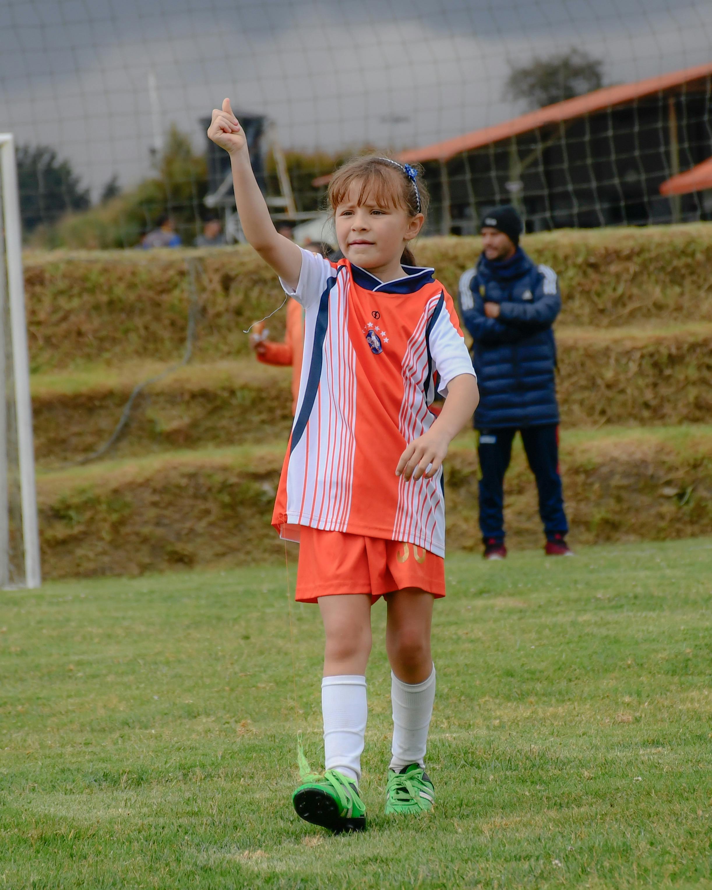 girl playing football