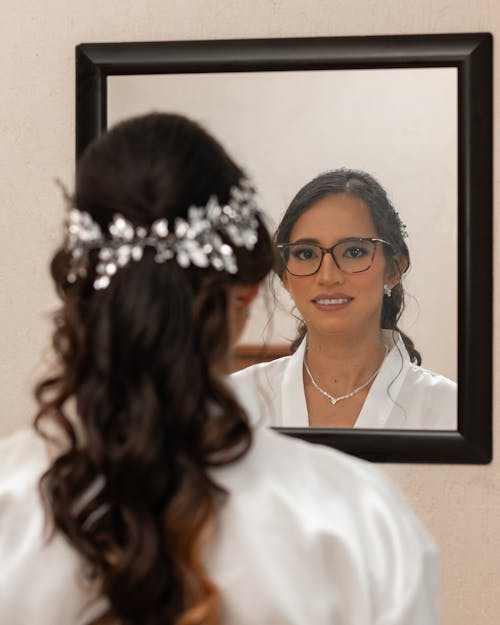 Smiling Woman in Mirror