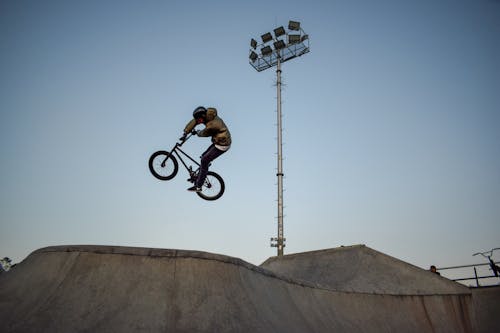 Man on Bicycle Midair