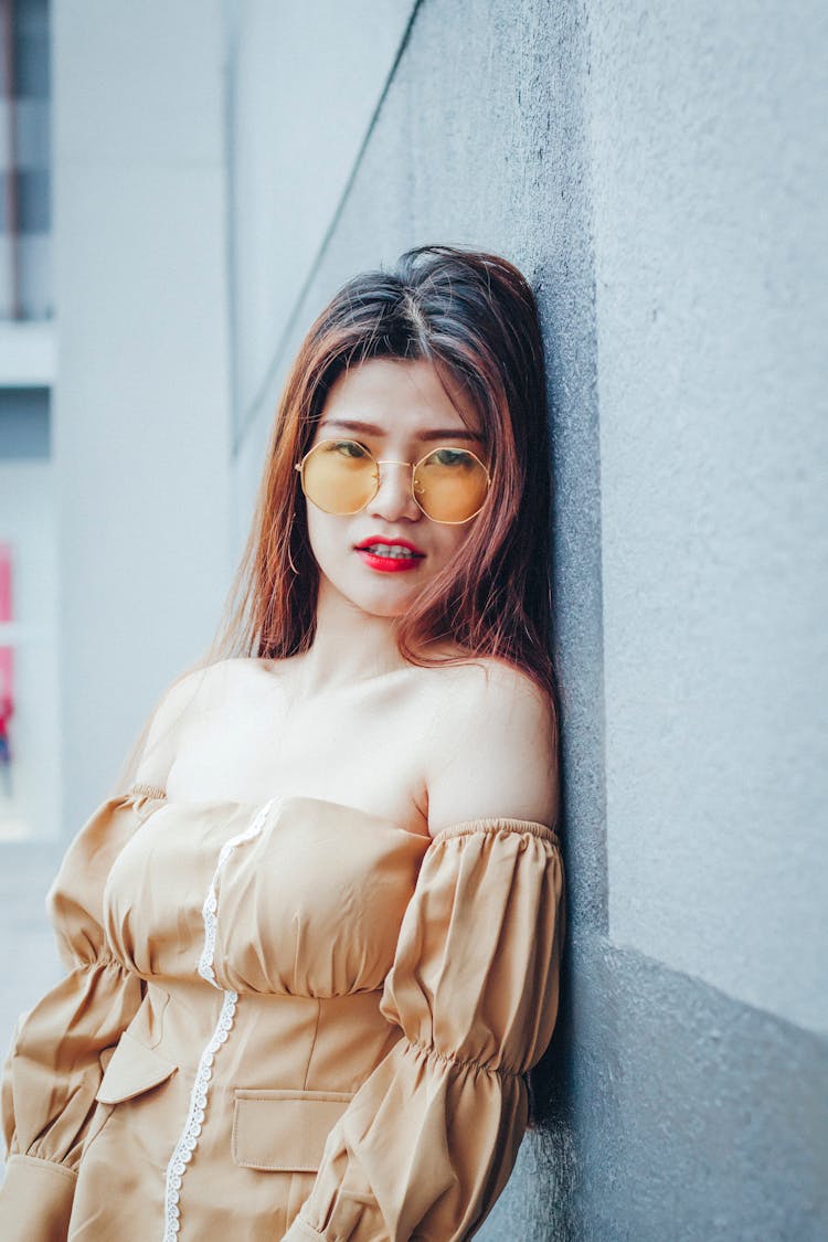 Woman Leaning On Wall