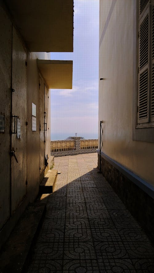 Foto d'estoc gratuïta de arquitectura tradicional, carreró, edificis