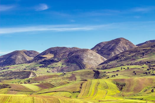 A breathtaking aerial view of the lush, rolling hills and mountains in Mateur, Tunisia.