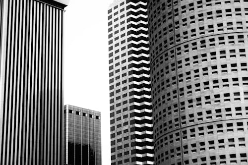 A black and white photo of tall buildings