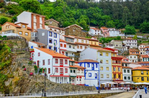 Free Vibrant hillside houses in Cudillero, Spain, showcasing unique architecture and scenic views. Stock Photo