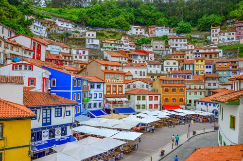 Free Charming view of colorful hillside houses in Cudillero, Spain. Vibrant architecture and scenic town. Stock Photo