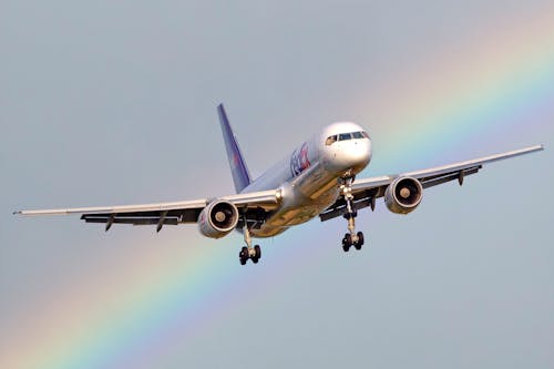 Rainbow behind Cargo Airplane