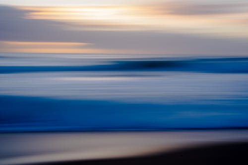 Blurred Photo of Water at Sunset 