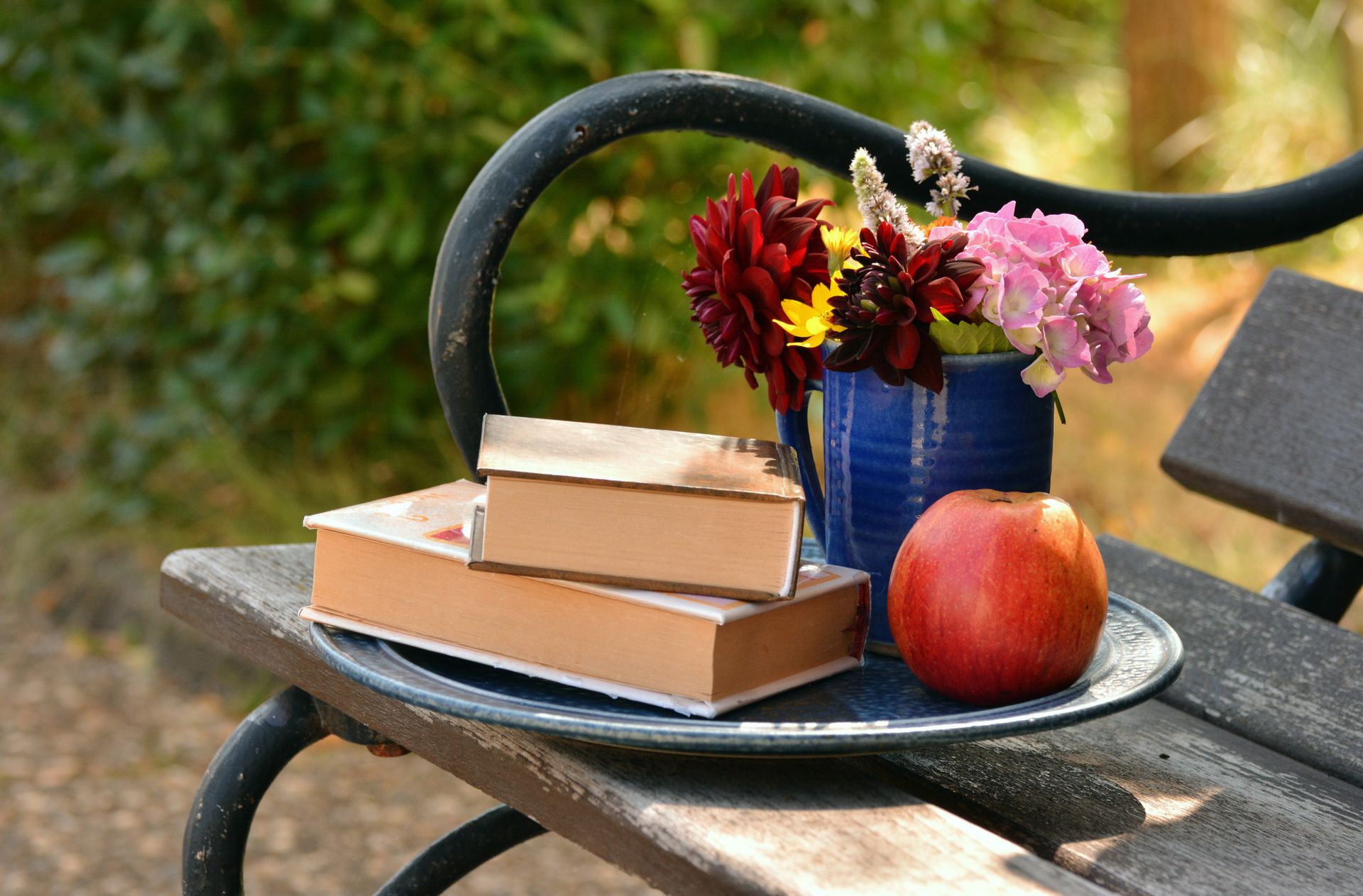 2 Books on Top of Each Other Beside Red Apple Fruit
