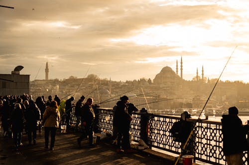 Scenic Photo of Fishermen and Walking People in Istanbul, Turkey
