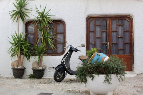 Scooter Parked by House