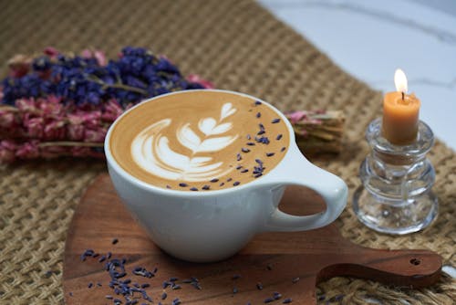 Free Close-up of a Cup of Coffee with Latte Art  Stock Photo