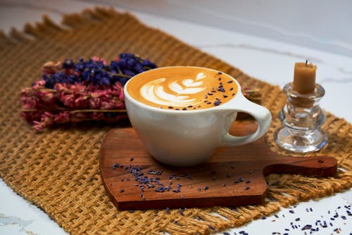 Free Close-up of a Cup of Coffee with Latte Art Stock Photo