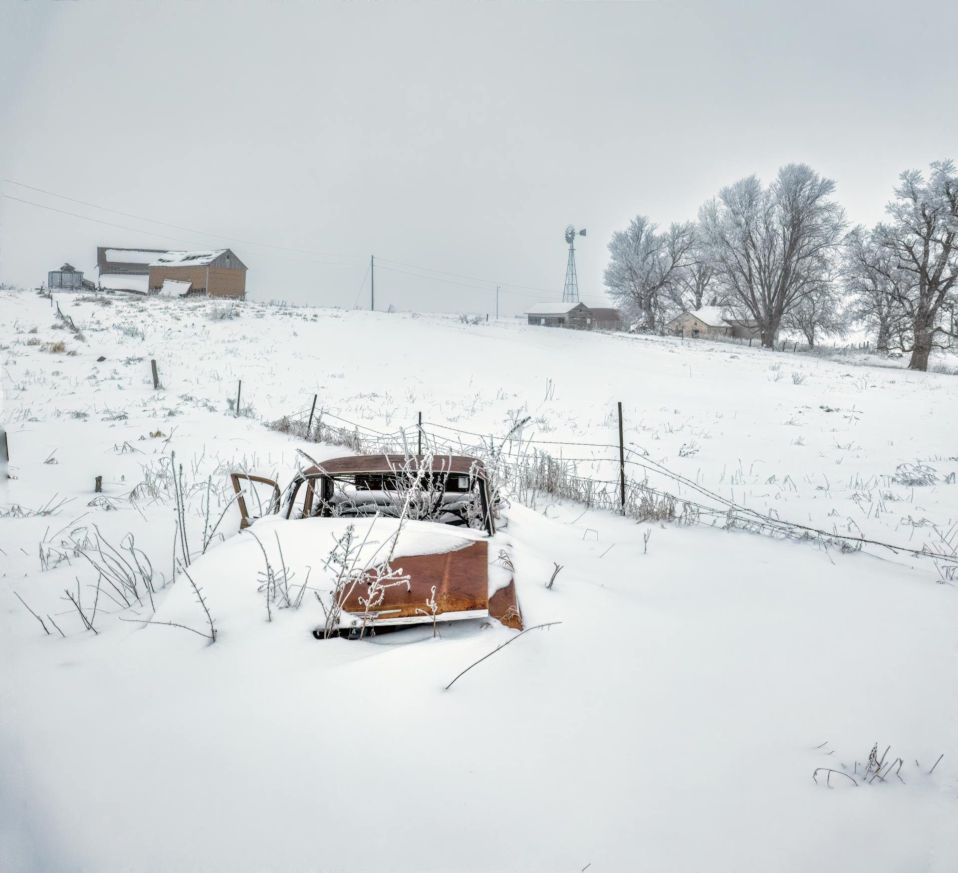 Rusty Car Wreck in Winter