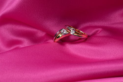 Close-up of a Ring on a Pink Silk Fabric 