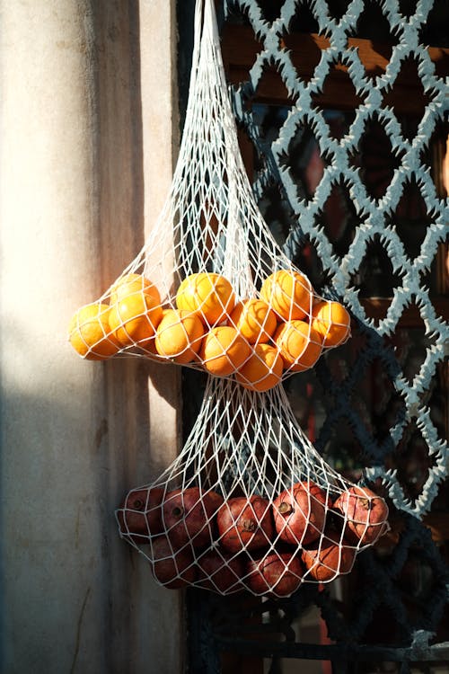 垂直拍攝, 掛, 檸檬 的 免費圖庫相片